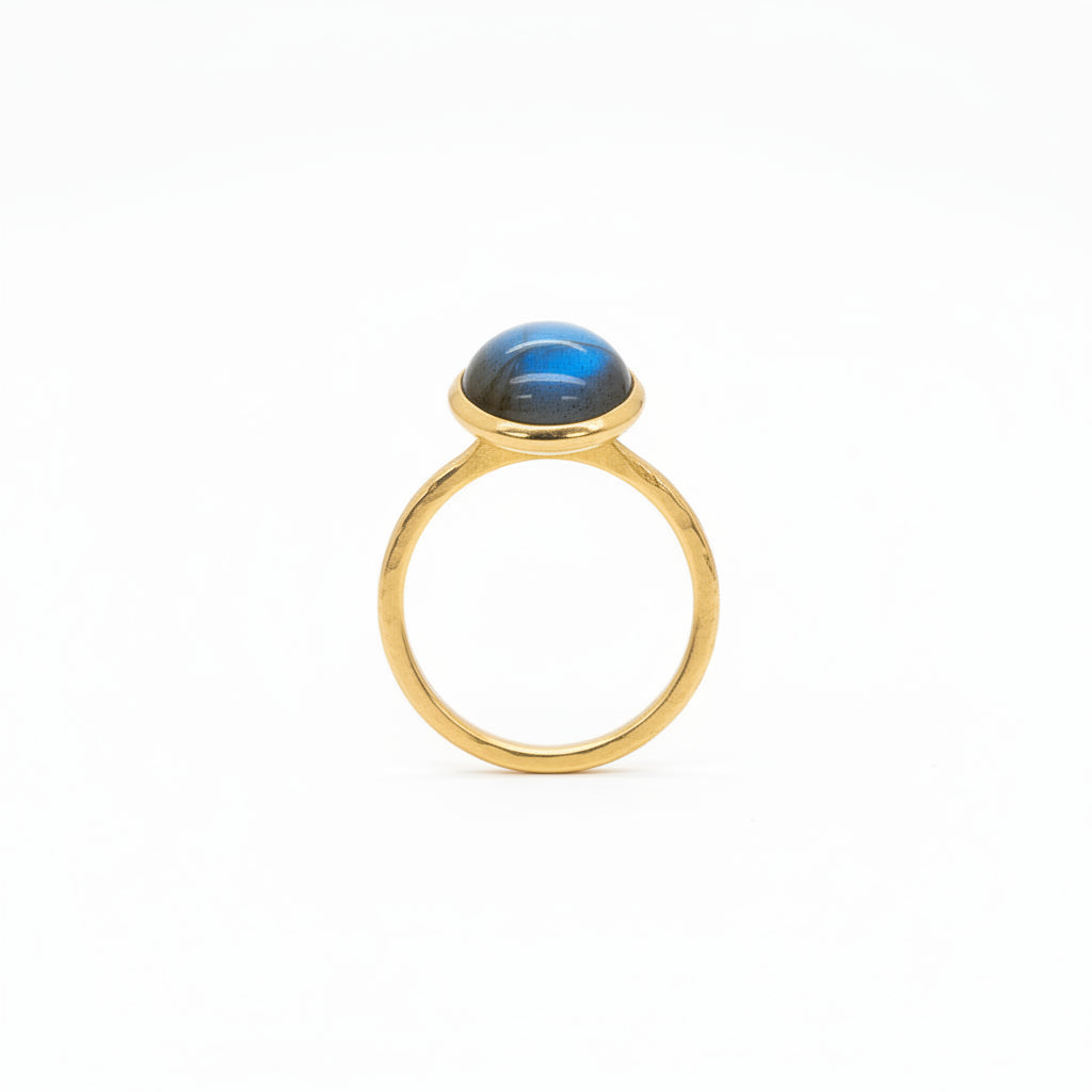 A smooth petite labradorite gemstone ring wrapped in a delicate embrace of 0.5 micron 14-carat gold over brass