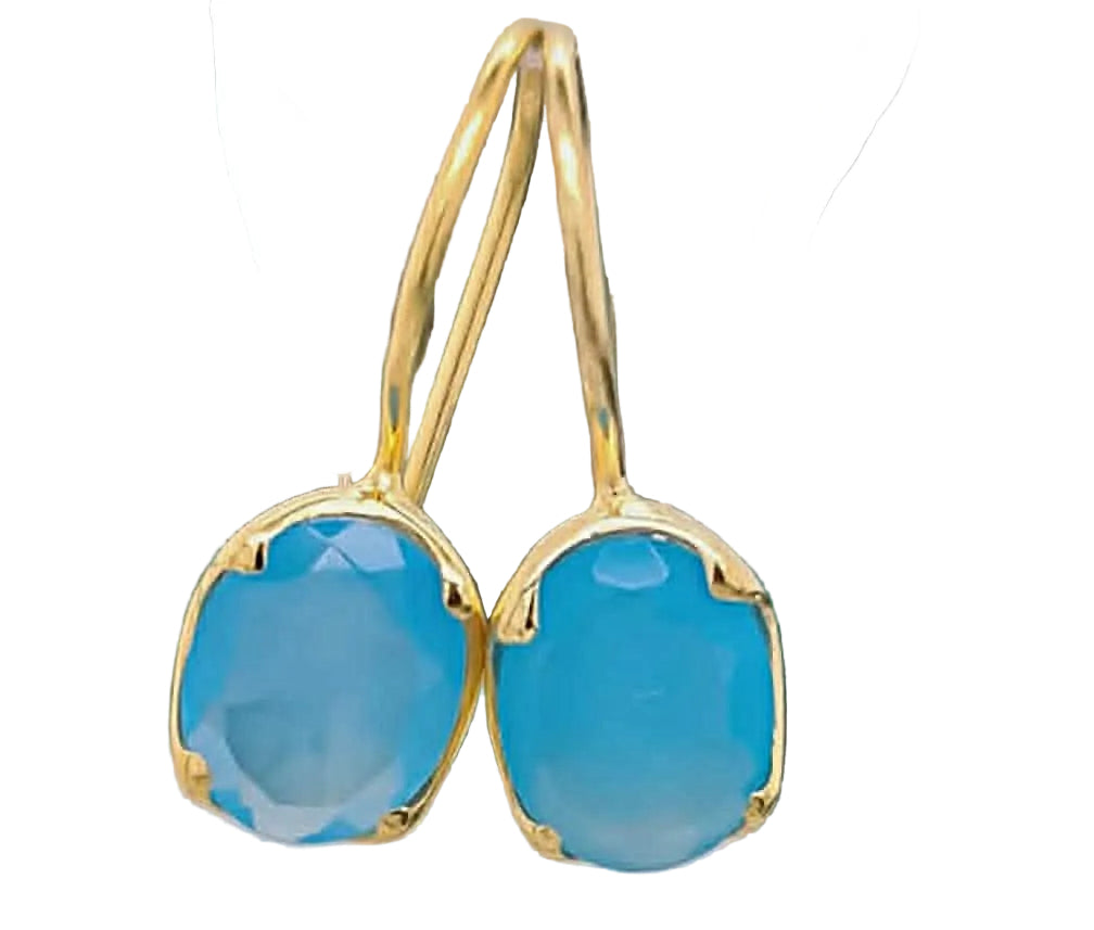 Gold-enhanced sterling silver hook earrings feature luminous blue chalcedony gemstones nestled securely within a beautifully sculpted wave-inspired setting.