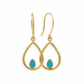 Hook swing earrings with a petite turquoise gem nestled in a warm gold-over-brass teardrop shape