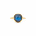 A smooth petite labradorite gemstone ring wrapped in a delicate embrace of 0.5 micron 14-carat gold over brass