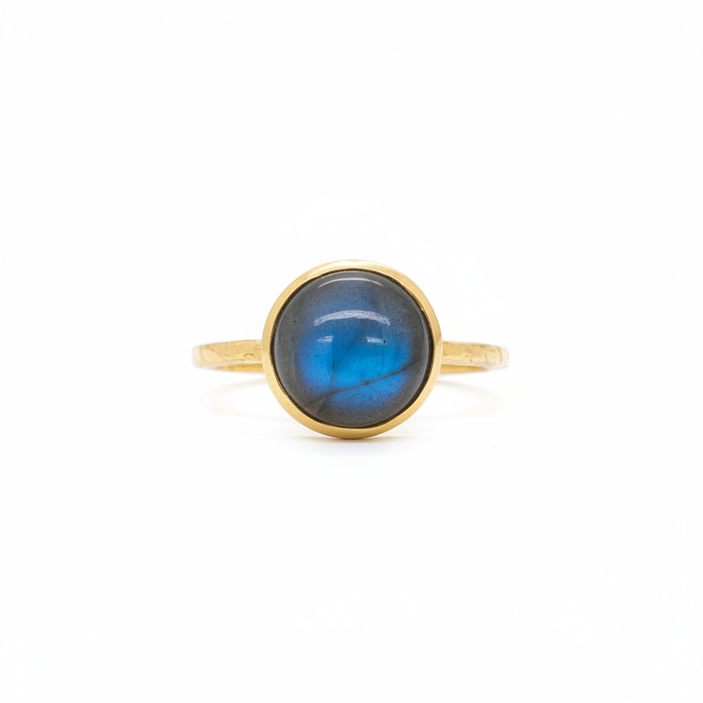 A smooth petite labradorite gemstone ring wrapped in a delicate embrace of 0.5 micron 14-carat gold over brass