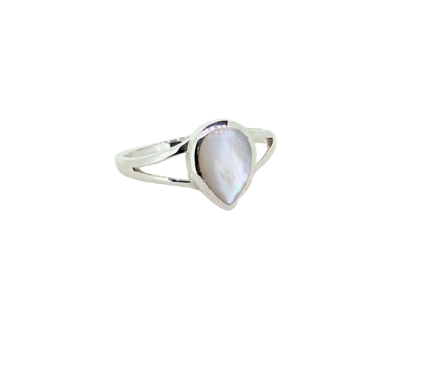 Silver ring with a teardrop-shaped gemstone on a textured beige surface