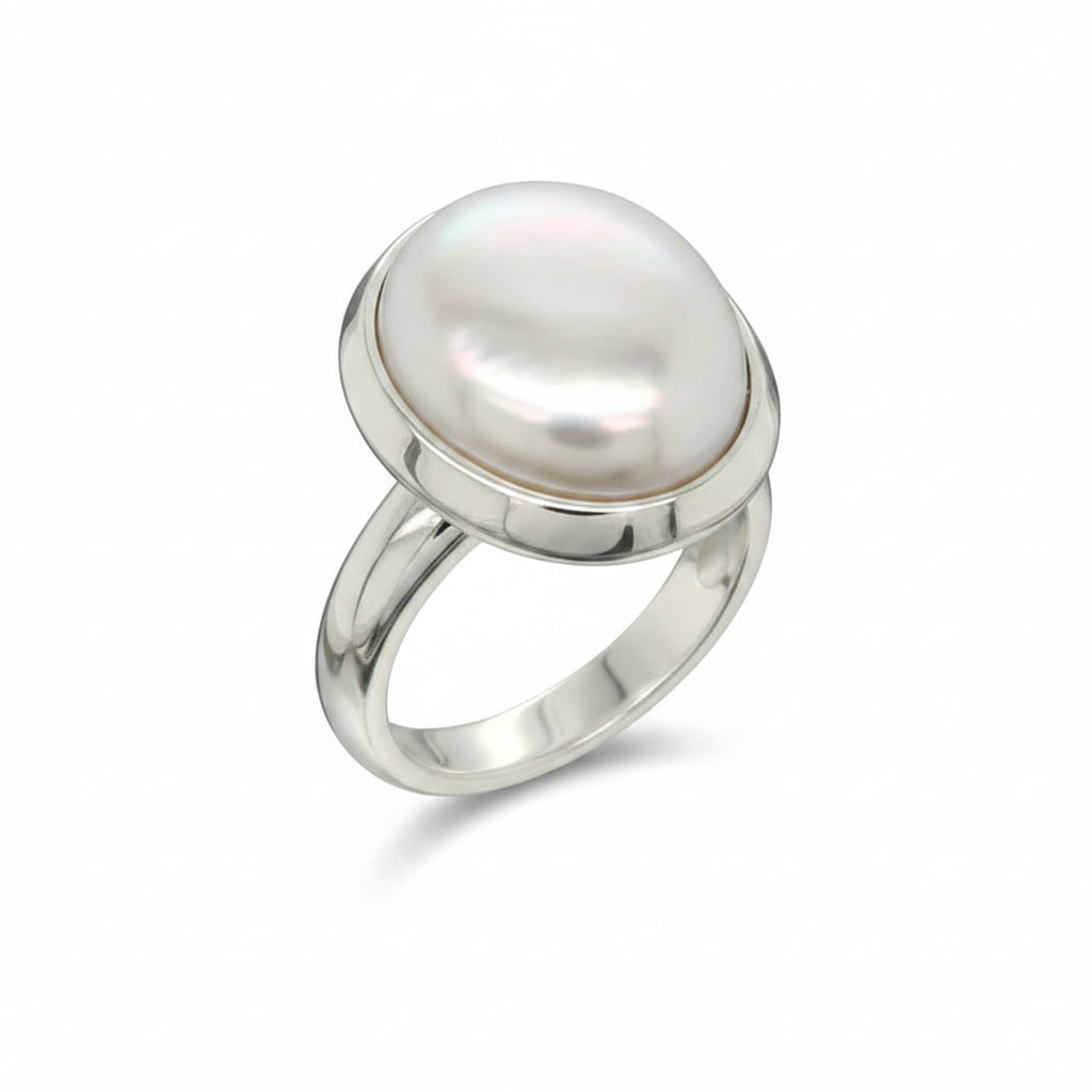 Luminous baroque pearl set in sterling silver with a graceful split band — beautifully unique
