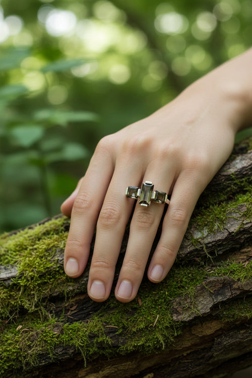 Silver ring with cut smoky quartz gemstones on in art deco setting